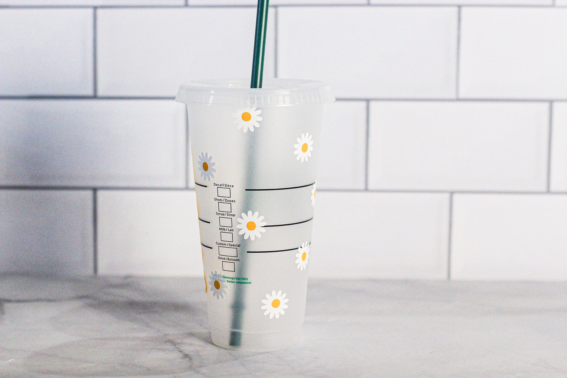 https://www.anokhigiftsco.com/cdn/shop/products/DaisyStarbucksTumbler9.jpg?v=1673775830&width=1946